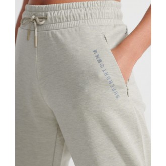 Superdry dámské tepláky Training - Krémová